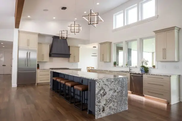 white walled room with marble kitchen island table -how long does a kitchen remodel take